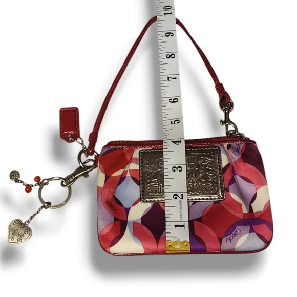 Coach Wristlet with charms, like NEW!! - Picture 7 of 8